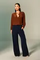 Calça Flare Bolsos