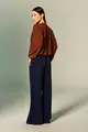 Calça Flare Bolsos